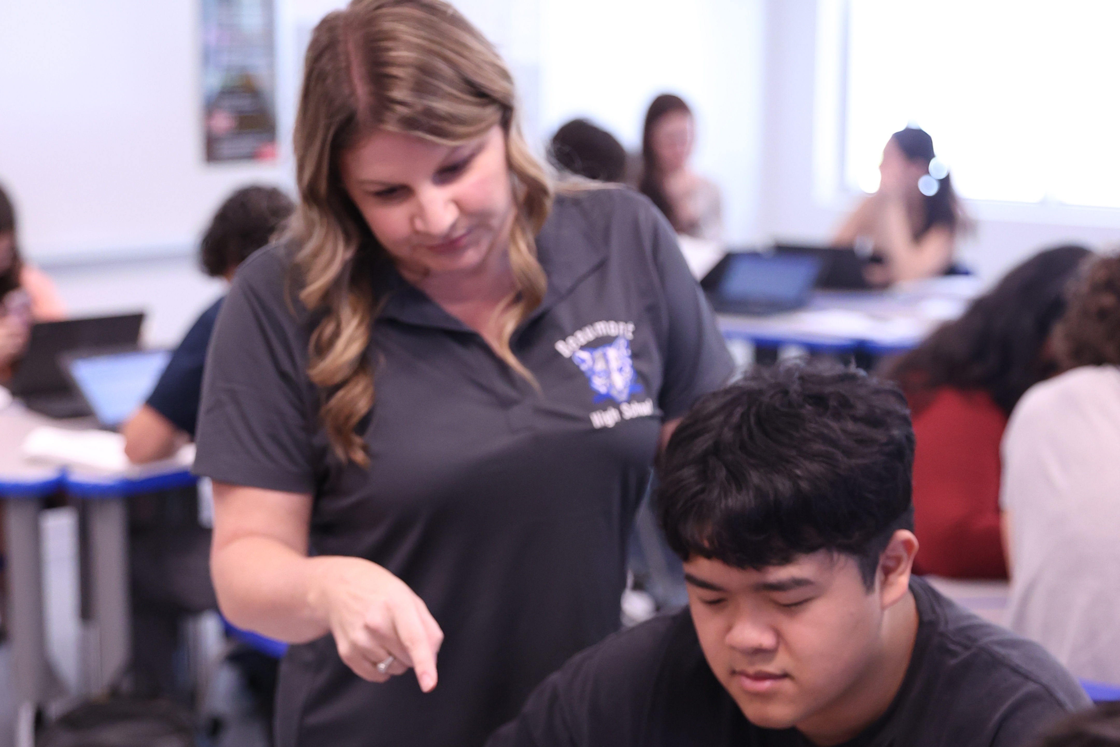 Jackie Wagner helping a student
