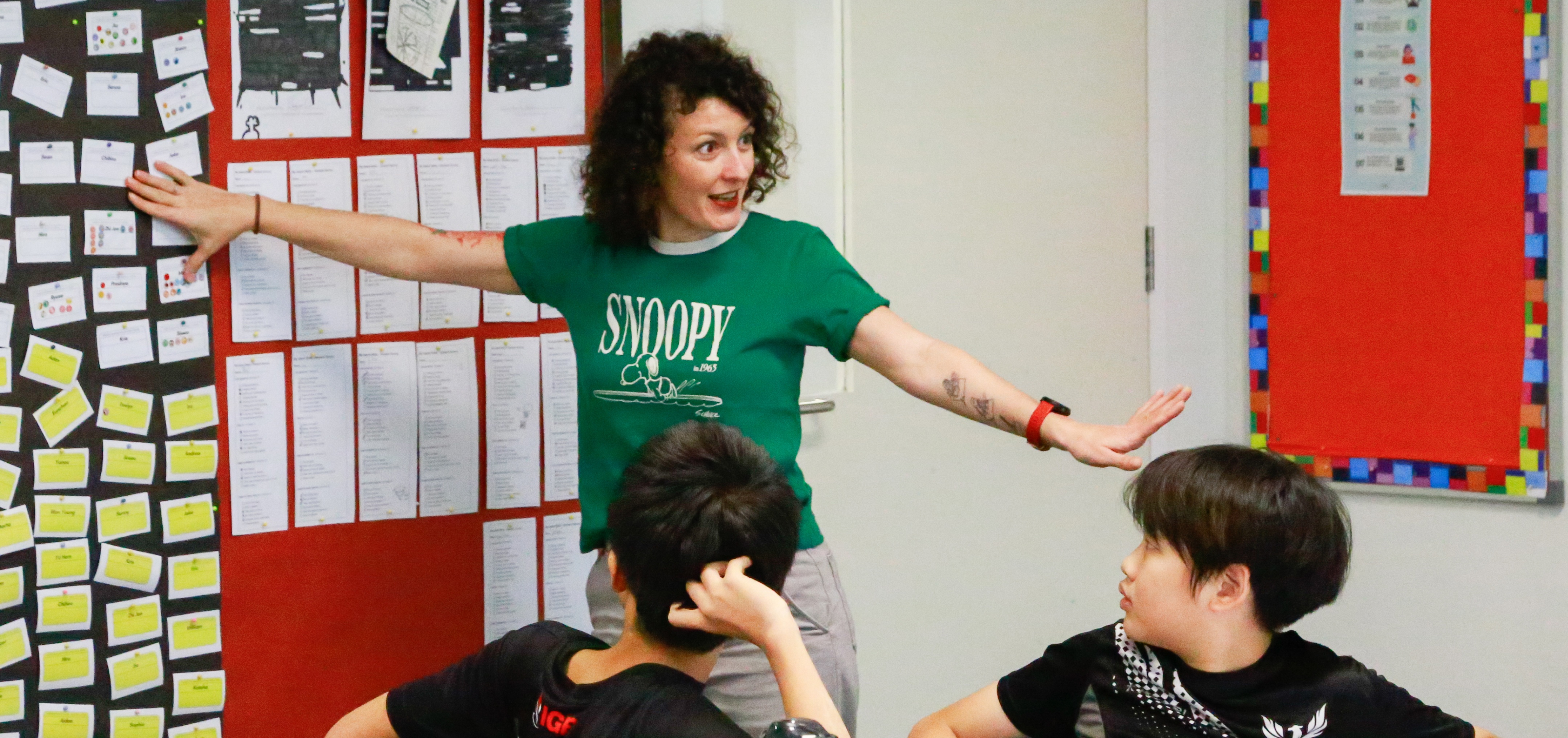 Teacher instructing students